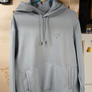 American Eagle Outfitters Men's Light Blue Hoodie with Subtle Logo